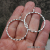 ES-172 Twisted Sterling Silver Hoops - Shiny