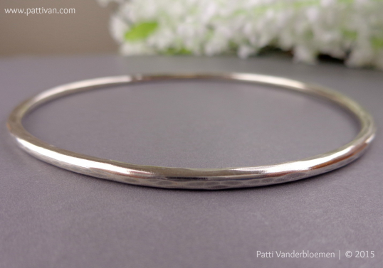 Heavy  Faceted Sterling Silver Oval Bangle
