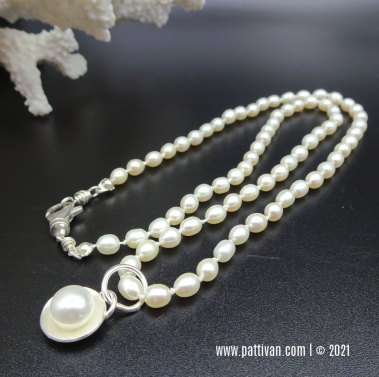 Hand Knotted Pearl Necklace with Sterling Silver Enhancer
