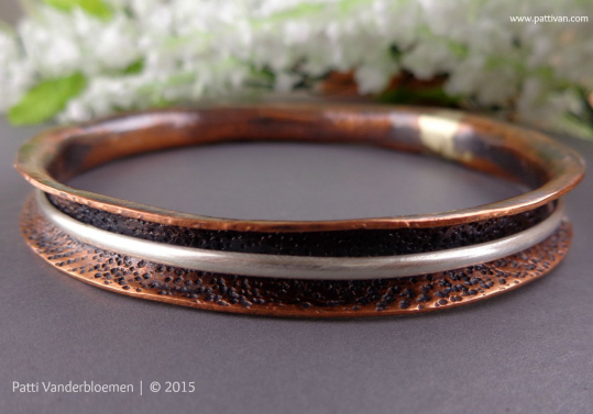 Copper Anticlastic Bangle with Sterling Silver Spinner