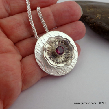 Sterling Silver Flower with Faceted Garnet