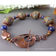 artisan_lampwork_and_lapis_gemstones_bracelet_by_patti_vanderbloemen-1.jpg
