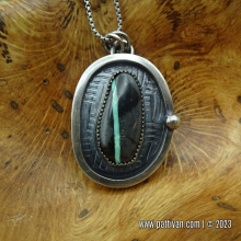 boulder_ribbon_turquoise_and_sterling_silver_pendant-patti_vanderbloemen-1.jpg