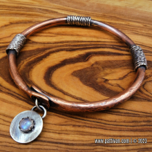 copper_bangle_with_sterling_silver_and_rainbow_moonstone_accents-patti_vanderbloemen-2.jpg