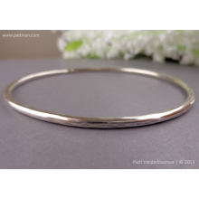faceted_oval_sterling_bangle_by_patti_vanderbloemen-1.jpg