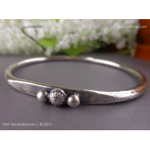 heavy_gauge_sterling_bangle_with_ornate_decorations_accents_by_patti_vanderbloemen-1.jpg