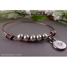 mixed_metal_bangle_with_handcrafted_sterling_charm_by_patti_vanderbloemen-6.jpg