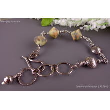 pastel_speckled_artisan_beads_and_sterling_adjustable_bracelet_by_patti_vanderbloemen-2.jpg