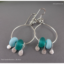 sterling_silver_hoops_with_tiny_green_beads_and_silver_charms_by_patti_vanderbloemen-1.jpg