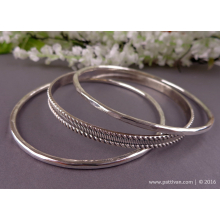 sterling_silver_stacking_bangles_set_by_patti_vanderbloemen-1.jpg