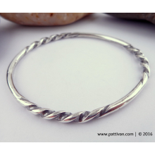 sterling_silver_twisted_bangle_by_pattivanderbloemen-1.jpg