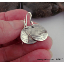 tiny_textured_silver_disc_earrings_by_patti_vanderbloemen-3.jpg
