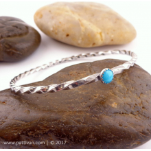 twisted_sterling_bangle_with_turquoise_cabochon_by_patti_vanderbloemen-1.jpg