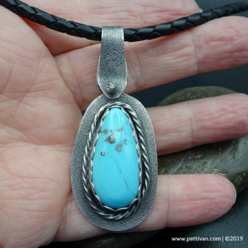 Campitos Turquoise and Textured Sterling Silver Pendant