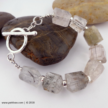 Rutilated Quarz and Sterling Silver Bracelet
