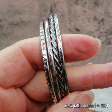 Set of 4 Textured Sterling Silver Bangles - (Small/Average Size Bangles)
